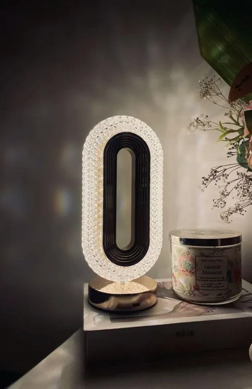Decorative LED table lamp with oval design